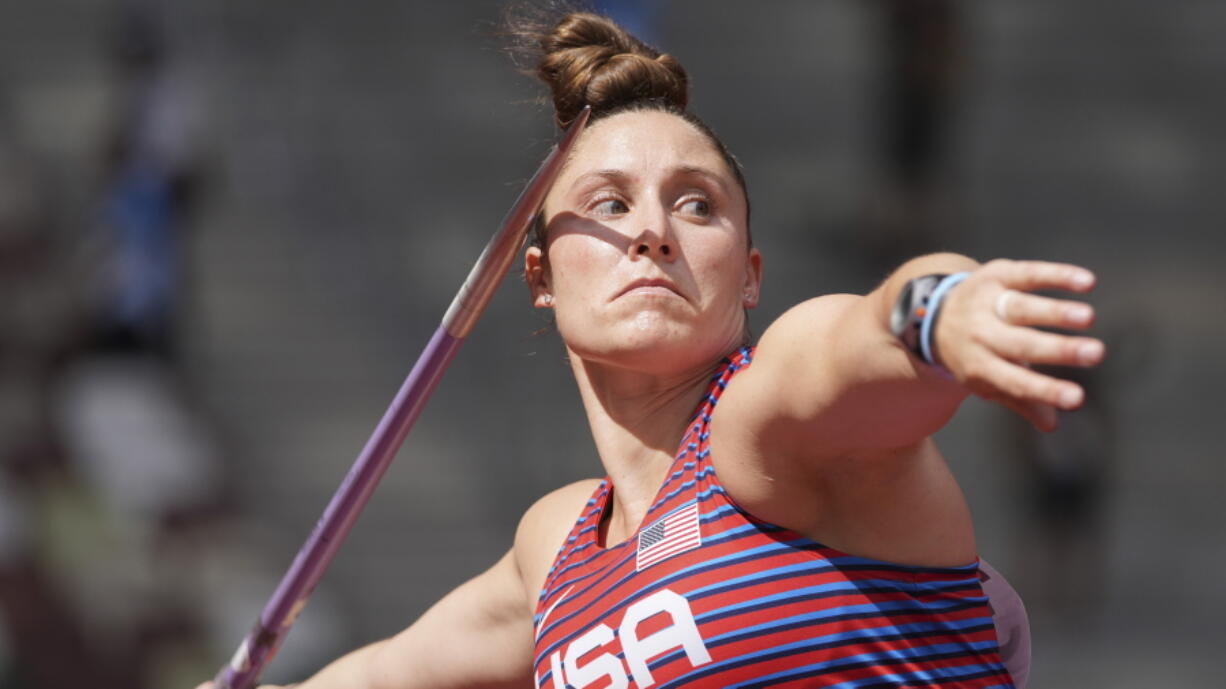 Kara Winger, of United States, competes in qualifications for the women's javelin throw at the 2020 Summer Olympics, Wednesday, Aug. 3, 2021, in Tokyo.