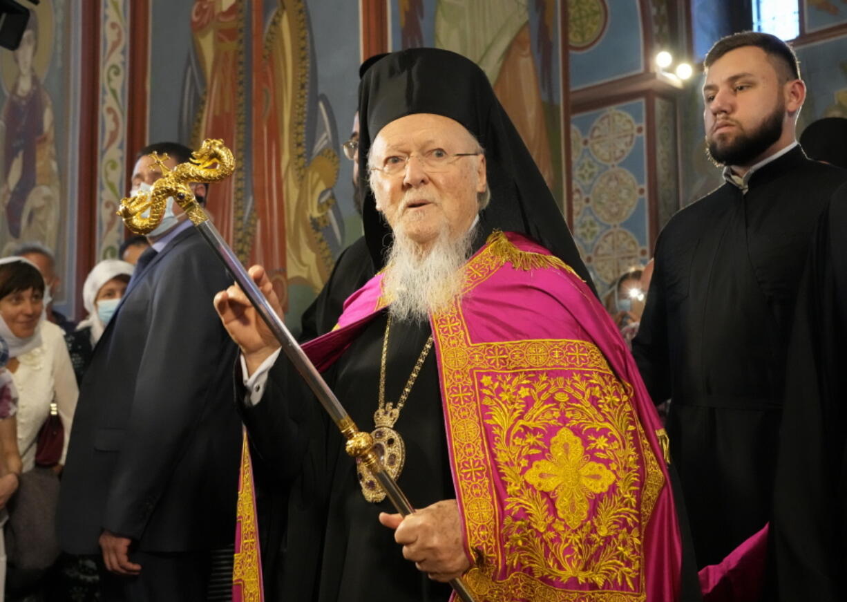 Ecumenical Patriarch Bartholomew I, blesses parishioners in the Mikhailovsky Zlatoverkhy Cathedral (St. Michael's Golden-Domed Cathedral) in Kyiv, Ukraine, Saturday, Aug. 21, 2021.