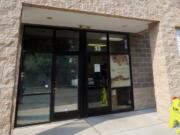 The entrance of Scales and Tails Utah is shown Monday, Aug. 16, 2021, in West Valley City, Utah. A Utah reptile center employee is recovering after an alligator yanked her into its enclosure during a presentation, and a visitor leapt in after her and freed her from its jaws.