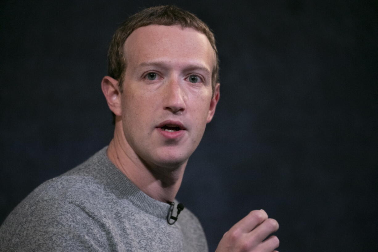 FILE - This Oct. 25, 2019 file photo shows Facebook CEO Mark Zuckerberg speaking at the Paley Center in New York. Zuckerberg donated $400 million to help fund election offices as they scrambled to deal with the coronavirus pandemic late last summer. At least eight GOP-controlled states have passed bans on donations to election offices this year as Republicans try to block outside funding of voting operations.