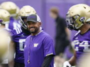 Washington head coach Jimmy Lake and the Huskies begin the 2021 season as one of the favorites in the Pac-12 North Division, while also trying to erase the bad taste of how last year ended when a COVID-19 outbreak brought a sudden end to an already truncated schedule.