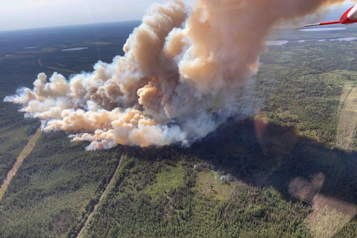 This Aug. 15, 2021, photo provided by U.S. Forest Service-Superior National Forest shows a rapidly growing wildfire in northeastern Minnesota that has prompted some evacuations, the U.S. Forest Service said Monday, Aug. 16, 2021. The fire was spotted around 3 p.m. Sunday near Greenwood Lake, about 15 miles southwest of Isabella, in the Superior National Forest.