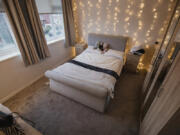 Also known as fairy lights or twinkle lights, string lights are a good way to add coziness to a room.