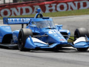 Driver Alex Palou sits second in the IndyCar standings with just the three-race West Coast swing remaining. That swing starts Sunday with the Grand Prix of Portland. (AP Photo/Tom E.