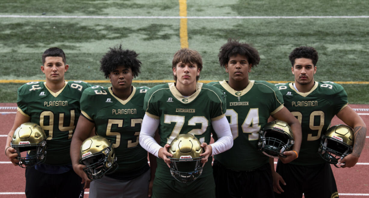 From left, junior Carlos Churape, sophomore Steve Canda III, sophomore Fox Crader, junior Koby Kast and senior David Kailea pose for a portrait at a practice on Wednesday, Sept. 15, 2021, at McKenzie Stadium.