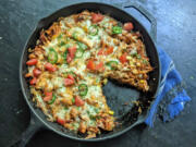 Chicken tamale casserole is an easy weeknight meal that's full of cheesy, Tex-Mex flavor.