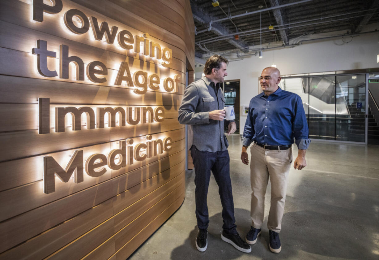 Chad Robins, CEO of Adaptive Biotechnologies and his brother and chief science officer, Harlan Robins in the entryway of their new facility they will soon be opening in Seattle, on September 17, 2021.