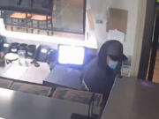 Vancouver police are investigating a break-in early Monday morning at Champ Pizza in east Vancouver. The store's video surveillance captured the burglar.