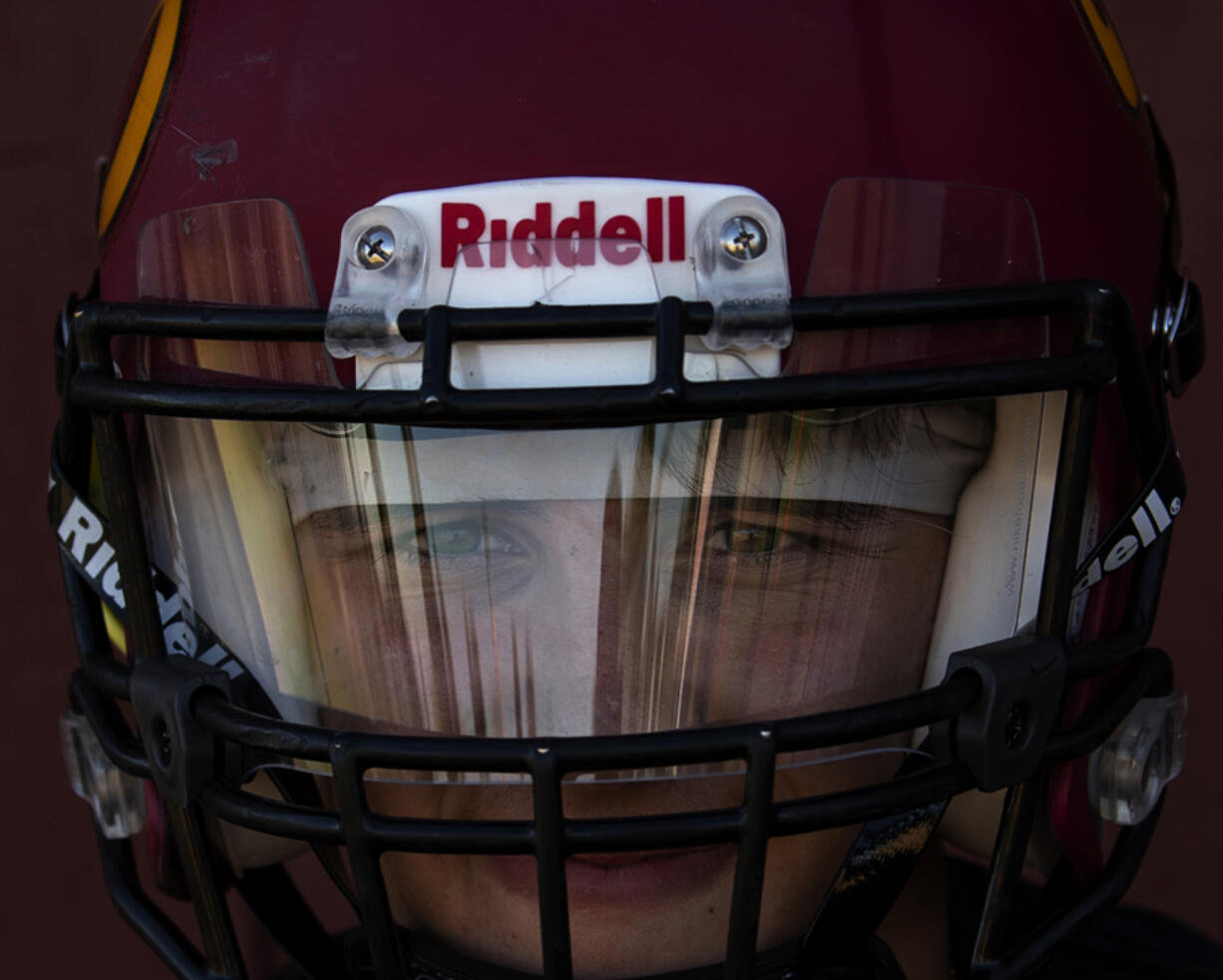 Sun reflects off Prairie senior running back Thor Stepina?s visor as he poses for a portrait during a practice Wednesday, Sept. 8, 2021, at Prairie High School.