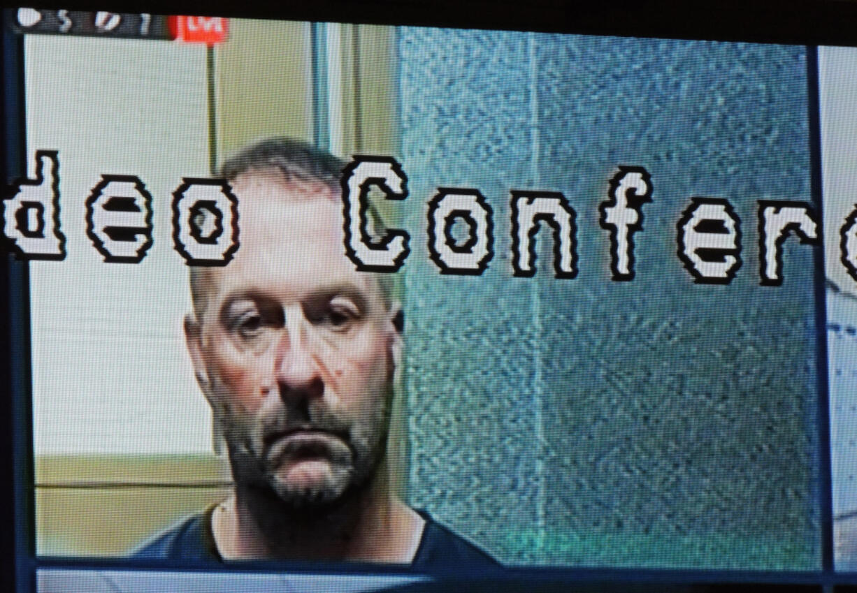 Washougal mayoral candidate Derik Ford appears in Clark County District Court Friday charged with fourth-degree assault domestic violence. Police say Ford became violent with a family member after an argument.