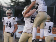 Kelso's Conner Noah celebrates a touchdown against the Prairie Falcons at District Stadium in Battle Ground on Friday, September 24, 2021.