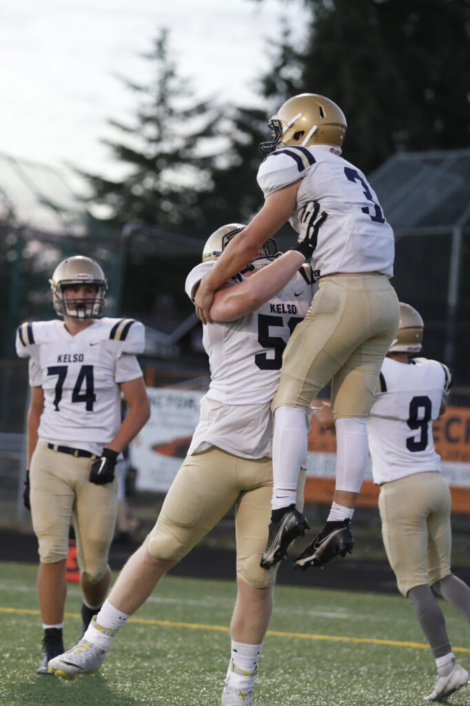 Kelso's Conner Noah celebrates a touchdown against the Prairie Falcons at District Stadium in Battle Ground on Friday, September 24, 2021.