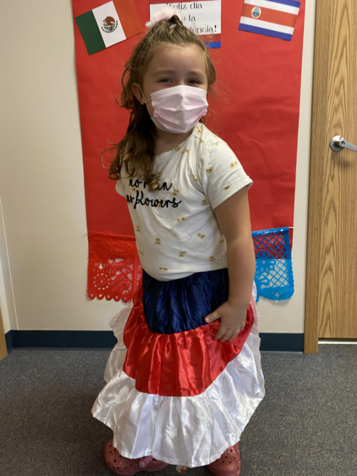 Pupils in the dual language kindergarten at Washougal are celebrating Viva la Independencia National Hispanic and Latinx Heritage Month. Selena Corona models a skirt.