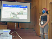 Gracie Taylor makes a presentation to an audience including Port of Vancouver Commissioner Eric LaBrant during a recent Youth Acting for our Earth training.