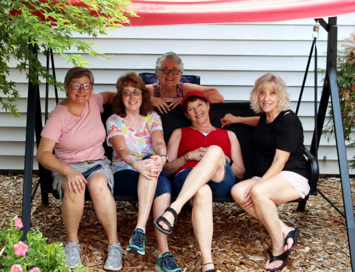 Minnehaha: Furry Friends auction committee members and a bunch of cute kittens were all pleased with the results of this year's online auction fundraiser.