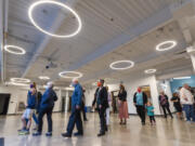 People walk through the common area of Vancouver Public Schools' new Jim Tangeman Center on Wednesday. The building, which serves around 50 students with special needs from kindergarten through 12th grade, opened on Aug. 31.