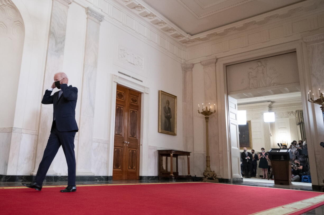 President Joe Biden walks from the podium after speaking about the end of the war in Afghanistan from the State Dining Room of the White House, Tuesday, Aug. 31, 2021, in Washington.