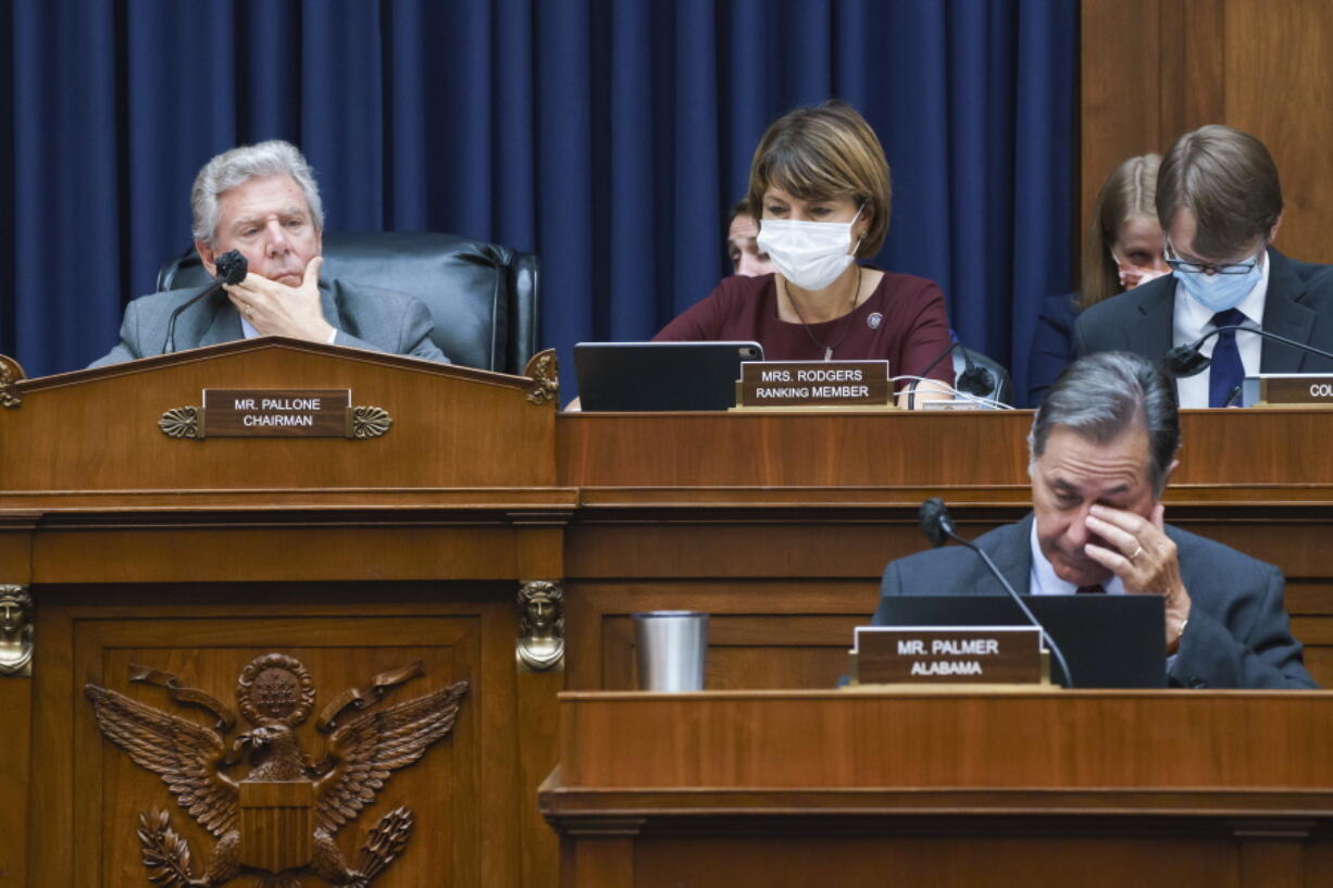 House Energy and Commerce Chairman Frank Pallone, D-N.J., left, with Rep. Cathy McMorris Rodgers, R-Wash., the ranking member, work on the "Build Back Better" package, a cornerstone of President Joe Biden's domestic agenda, at the Capitol in Washington, Wednesday, Sept. 15, 2021. (AP Photo/J.