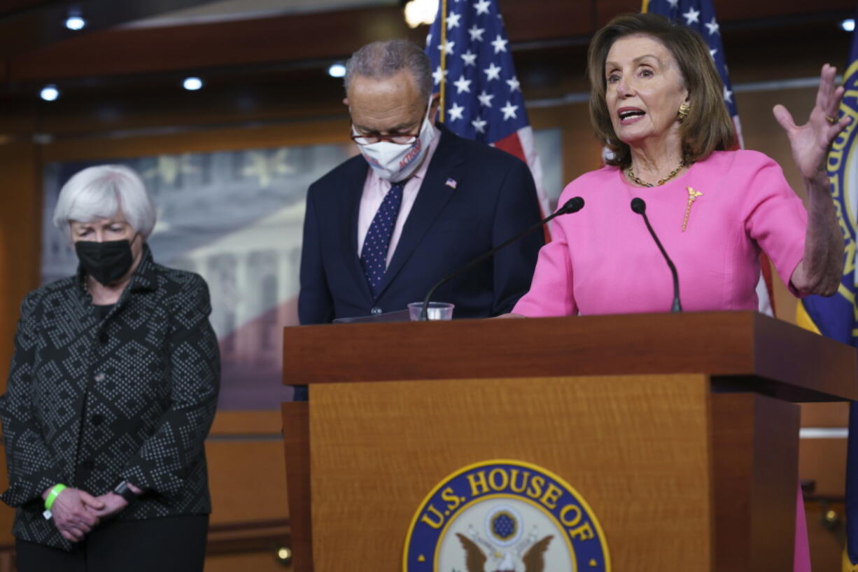 Speaker of the House Nancy Pelosi, D-Calif., right, Treasury Secretary Janet Yellen, left, and Senate Majority Leader Chuck Schumer, D-N.Y., update reporters on Democratic efforts to pass President Joe Biden's "Build Back Better" agenda, at the Capitol in Washington, Thursday, Sept. 23, 2021. (AP Photo/J.