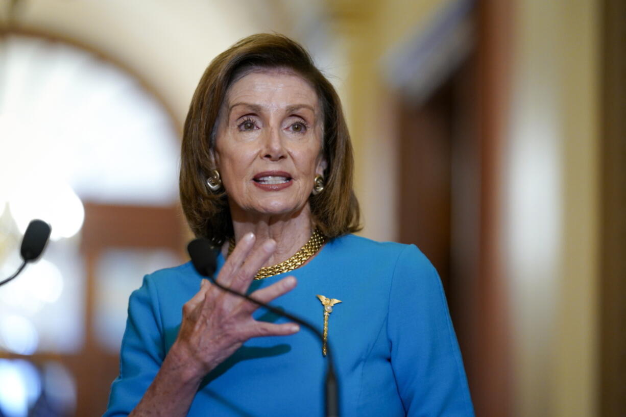 Speaker of the House Nancy Pelosi, D-Calif., talks to reporters as she welcomes Australian Prime Minister Scott Morrison, at the Capitol in Washington, Wednesday, Sept. 22, 2021. The House has approved legislation to fund the government, suspend its borrowing limit and provide federal disaster and refugee aid but Republicans in the Senate are expected to block the measure.(AP Photo/J.