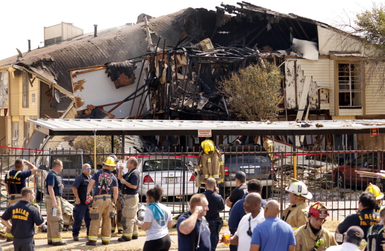 Dallas Fire and Rescue work the scene of an apartment explosion on Highland Hills Drive in southeast Dallas, Wednesday, Sept. 29, 2021. A natural-gas explosion tore apart the building injuring people and firefighters who arrived on scene to investigate the smell of natural gas.