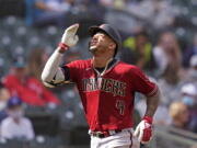 Arizona Diamondbacks' Ketel Marte motions as he heads home on his solo home run against the Seattle Mariners in the seventh inning of a baseball game Sunday, Sept. 12, 2021, in Seattle.