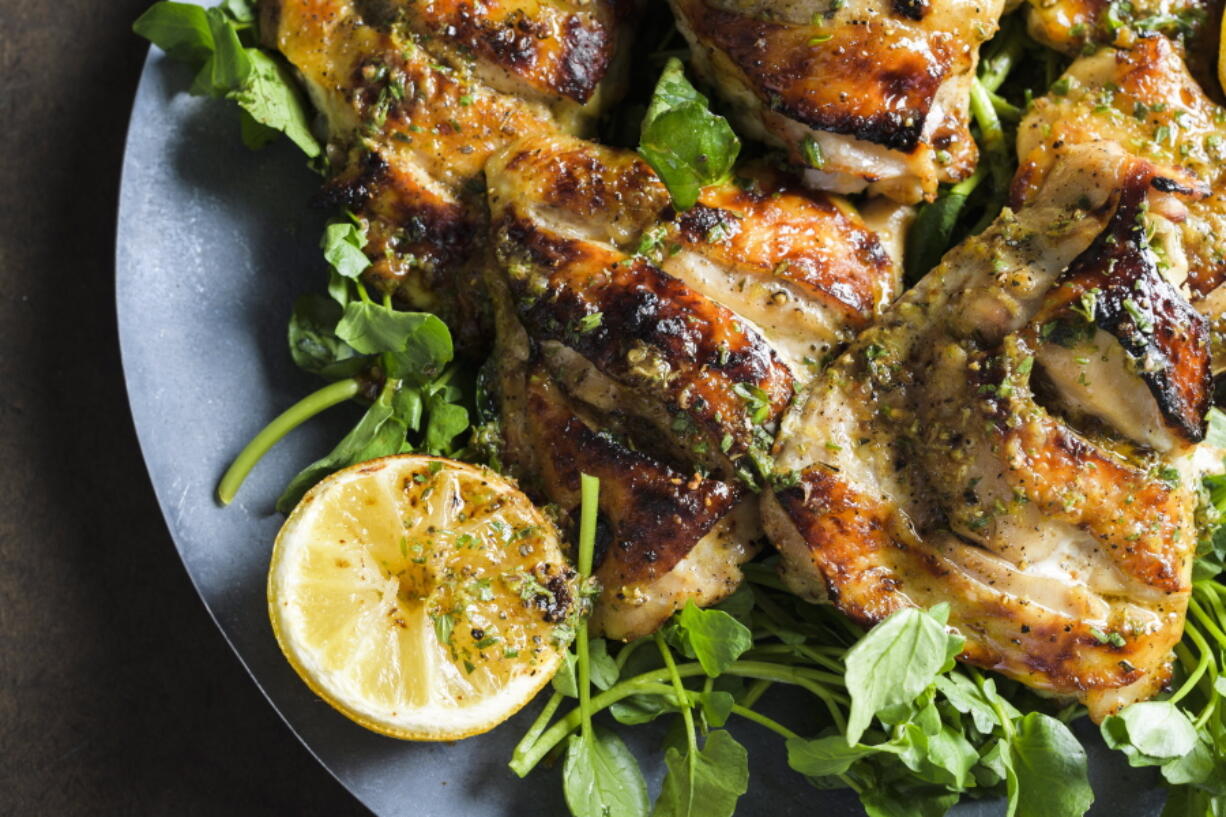 Chicken Salmoriglio made with grated lemon zest, garlic, oregano, salt and pepper.