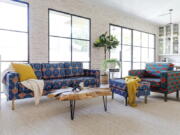 This photo provided by Albany Park shows the Ekaabo seating collection. Albany Park's founder Darryl Sharpton drew on his Nigerian heritage to create his Ekaabo seating collection. The name means 'welcome home', and the velvet upholstery's dynamic blue, orange and burgundy graphics echo West African design.