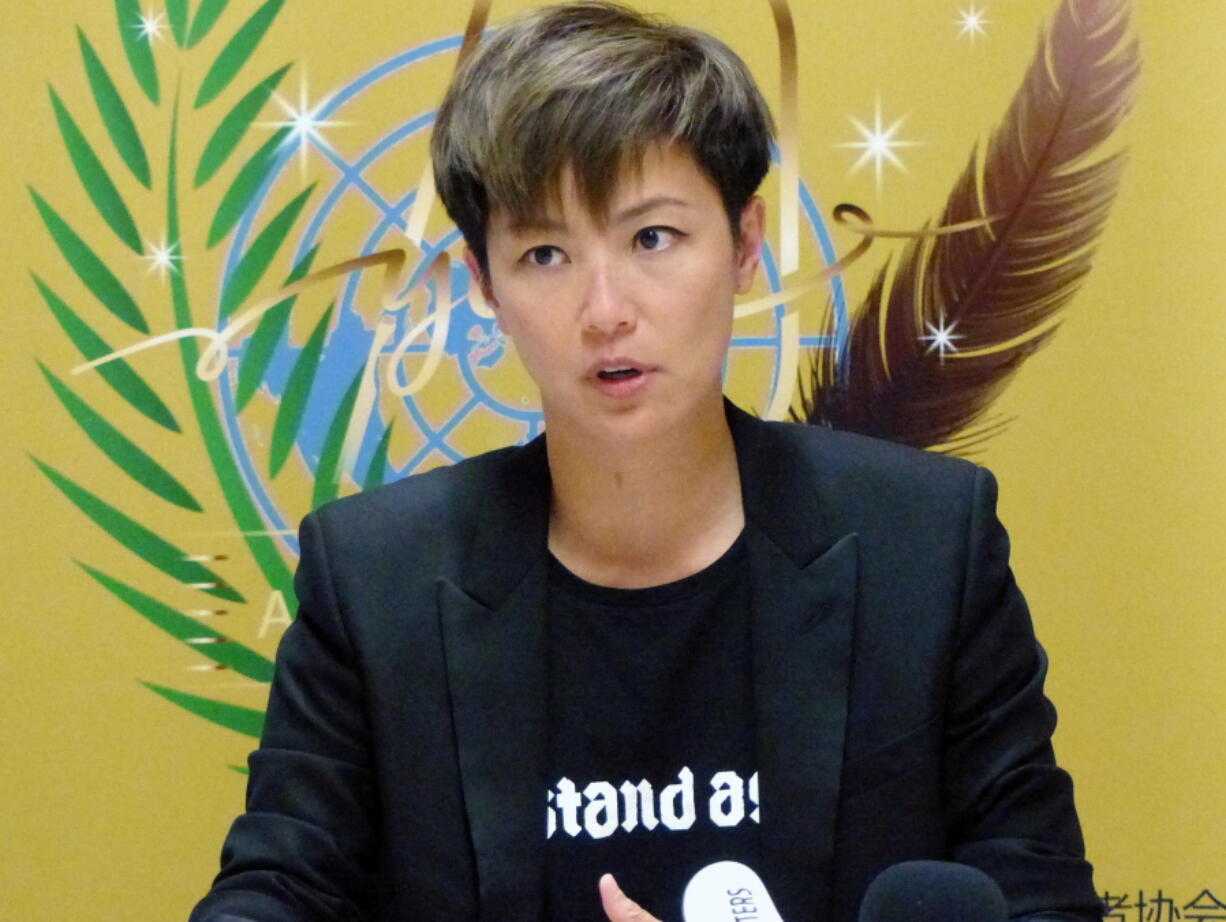 FIEL - In this July 8, 2019, file photo, Hong Kong pop singer Denise Ho speaks at the UN building in Geneva, Switzerland. Popular Hong Kong singer and pro-democracy activist Ho will not be allowed to perform at one of Hong Kong's top theaters later September, 2021, days after a pro-Beijing newspaper accused her of being anti-China.