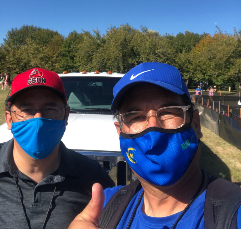 Columbian reporter Tim Martinez (left) with his much-older brother Ken Martinez, the longtime cross country coach at Aloha High School in Beaverton, Ore.