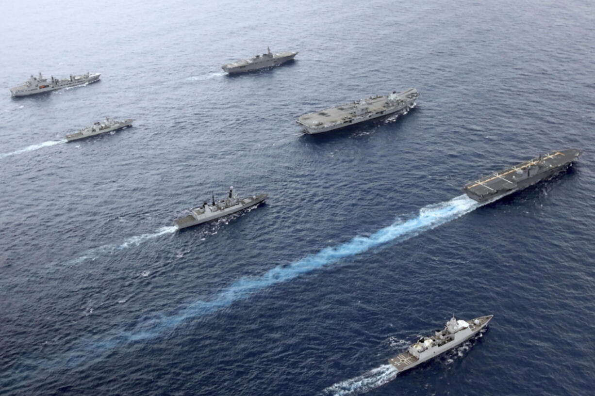 Front to back; HNLMS Evertsen, JS Izumo, HMS Defender, HMS Queen Elizabeth, HMCS Winnipeg, JS Ise, RFA Tidespring. UK Royal Navy Carrier Strike Group 21 HMS Queen Elizabeth, HMS Defender, RFA Tidespring and HNLMS Evertsen from CSG21 sails with Japanese ships JS Izumo and JS Ise along with the Canadian ship HMCS Winnipeg in the Pacific Ocean, Sept. 2021. With increasingly strong talk in support of Taiwan, a new deal to supply Australia with nuclear submarines, and the launch of a European strategy for greater engagement in the Indo-Pacific, the U.S. and its allies are becoming growingly assertive in their approach toward a rising China.