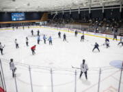 Seattle Kraken players and coaches workout during NHL hockey training camp at Kraken Community Iceplex on Thursday, Sept. 23, 2021, in Seattle.