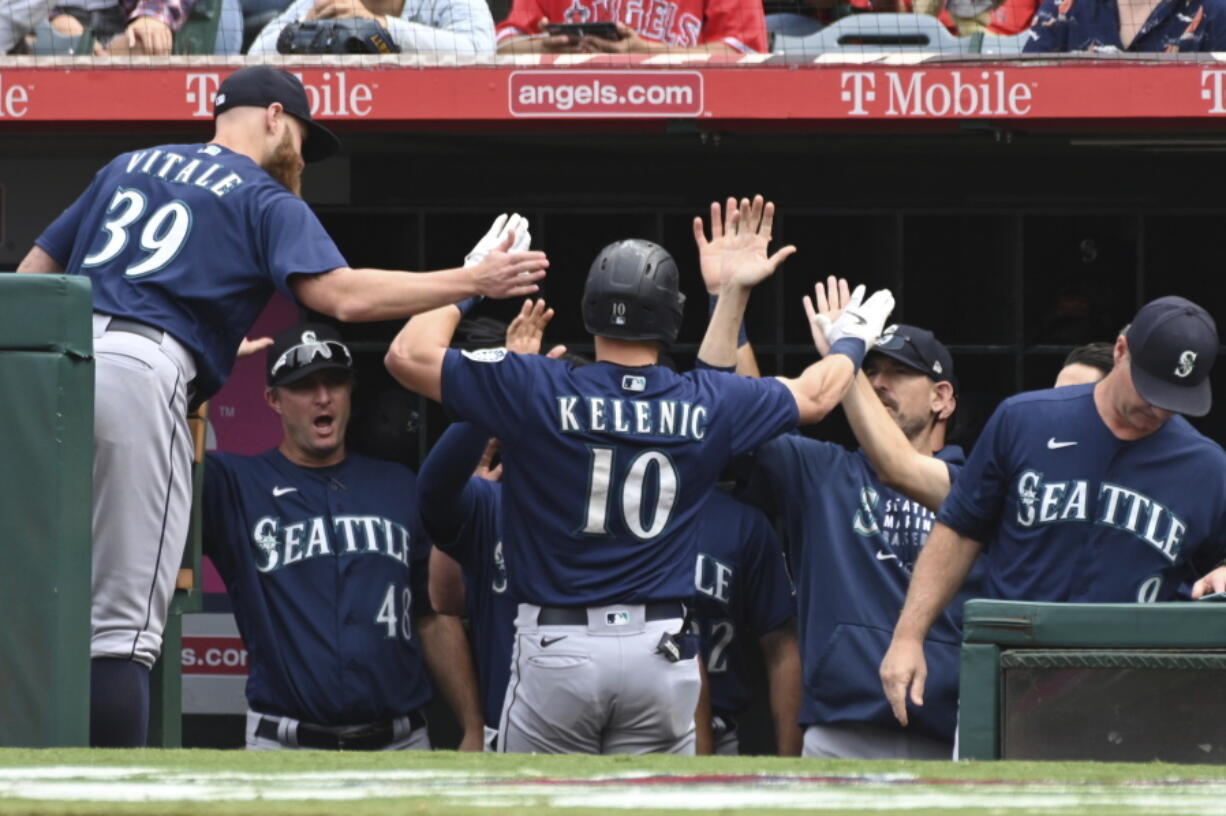 Los Angeles Angels pitcher Shohei Ohtani throws to home plate during the first inning of a baseball game against the Seattle Mariners, Sunday, Sept. 26, 2021, in Anaheim, Calif.