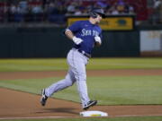 Seattle Mariners' Kyle Seager rounds the bases after hitting a home run against the Oakland Athletics during the fourth inning of a baseball game in Oakland, Calif., Wednesday, Sept. 22, 2021.