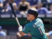 Seattle Mariners' Jarred Kelenic hits a two-run double during the first inning of a baseball game against the Kansas City Royals Sunday, Sept. 19, 2021, in Kansas City, Mo.