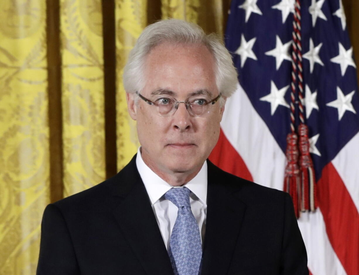 FILE - Author Louis Menand appears at a ceremony honoring him with the 2015 National Humanities Medal in the East Room of the White House in Washington on Sept. 22, 2016.  Menand's Cold War cultural history "The Free World" is among the works on the nonfiction longlist for the National Book Awards.