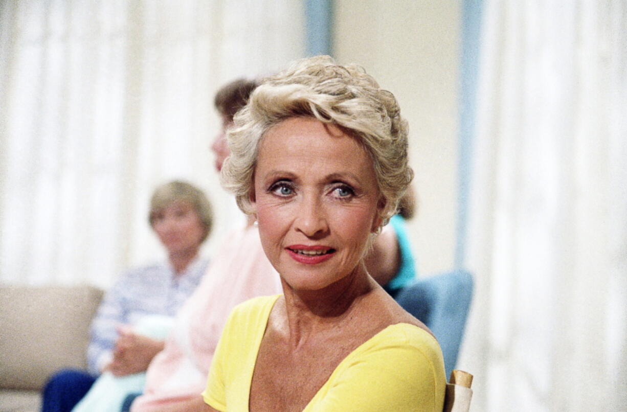FILE - In this July 1986 file photo, Actress Jane Powell poses for a  photo in New York. Jane Powell, the bright-eyed, operatic-voiced star of Hollywood's golden age musicals who sang with Howard Keel in "Seven Brides for Seven Brothers" and danced with Fred Astaire in "Royal Wedding," has died. Thursday, Sept. 16, 2021. She was 92.