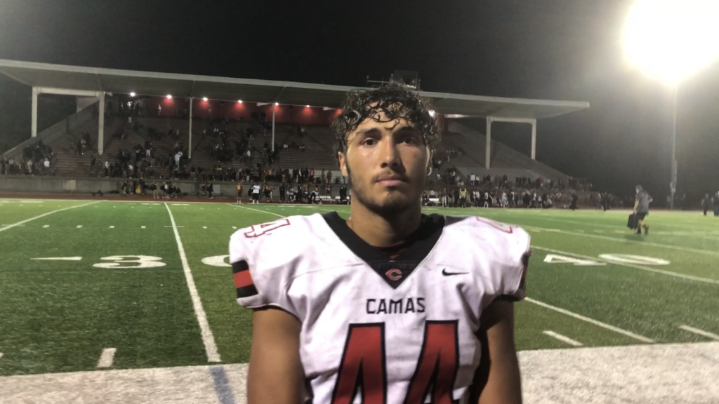 Camas senior linebacker Jairus Phillips talks during a postgame interview