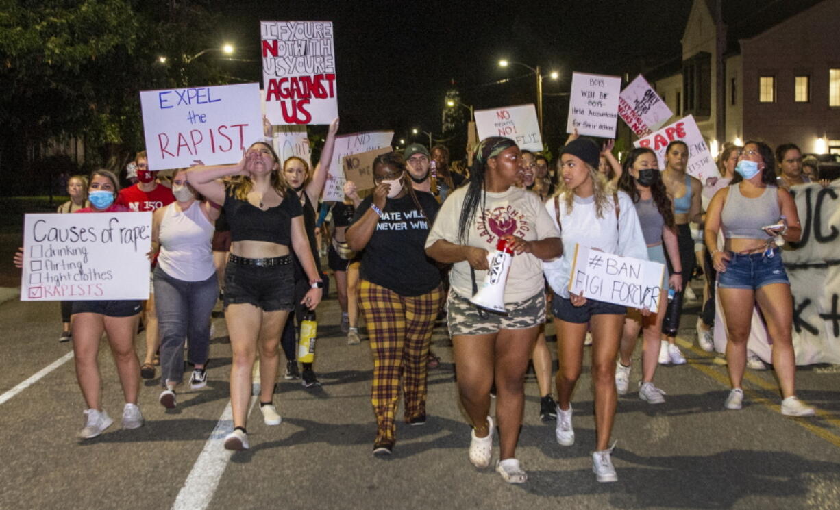 Protesters march around the campus on Wednesday, Aug. 25, 2021, in Lincoln, Neb., in response to the alleged sexual assault at the Phi Gamma Delta fraternity house. Students have protested since Aug. 24 after a student reported being sexually assaulted at the Phi Gamma Delta fraternity house. University of Nebraska-Lincoln Chancellor Ronnie Green temporarily suspended the Fiji house on Aug. 25.