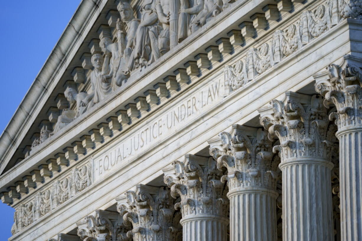 FILE - In this June 30, 2021, file photo the Supreme Court is seen in Washington. A deeply divided Supreme Court is allowing a Texas law that bans most abortions to remain in force, stripping most women of the right to an abortion in the nation's second-largest state. The court voted 5-4 to deny an emergency appeal from abortion providers and others that sought to block enforcement of the law that went into effect Wednesday, Sept. 1. (AP Photo/J.