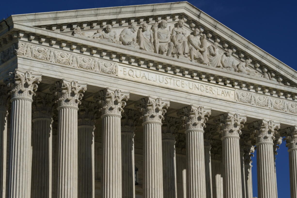 This Friday, Sept. 3, 2021, photo shows the Supreme Court in Washington. The Supreme Court term that begins next week is already full of contentious cases, including fights over abortion and guns. But the justices still have a lot of blank space on their calendar, with four more months of arguments left to fill. (AP Photo/J.