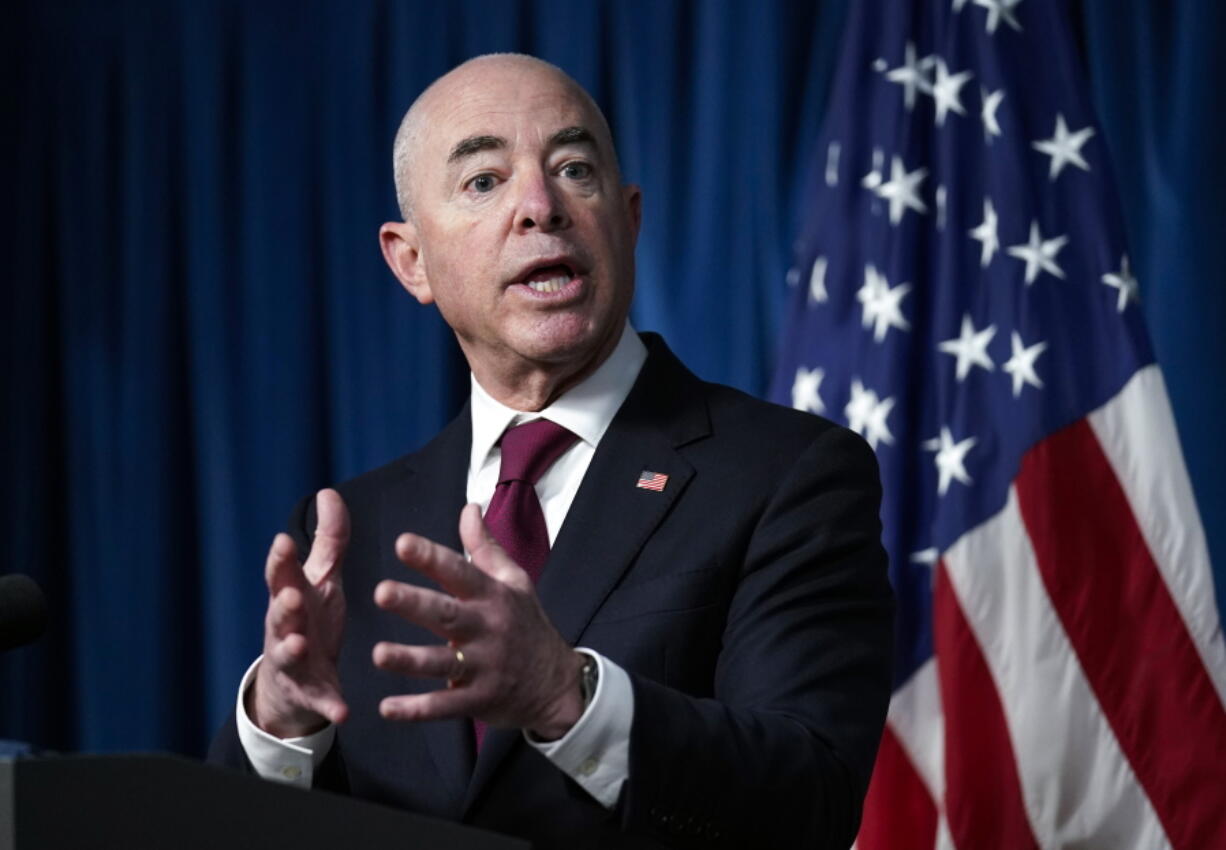 Homeland Security Secretary Alejandro Mayorkas updates reporters on the effort to resettle vulnerable Afghans in the United States, in Washington, Friday, Sept. 3, 2021. (AP Photo/J.