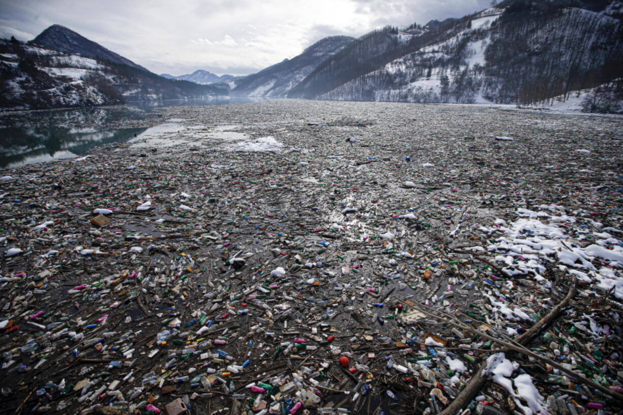 Plastic bottles and other garbage floats Jan. 22 in the Potpecko lake near Priboj, in southwest Serbia. An intergovernmental conference has taken early steps toward drawing up an agreement to curb plastic pollution and marine litter around the world.