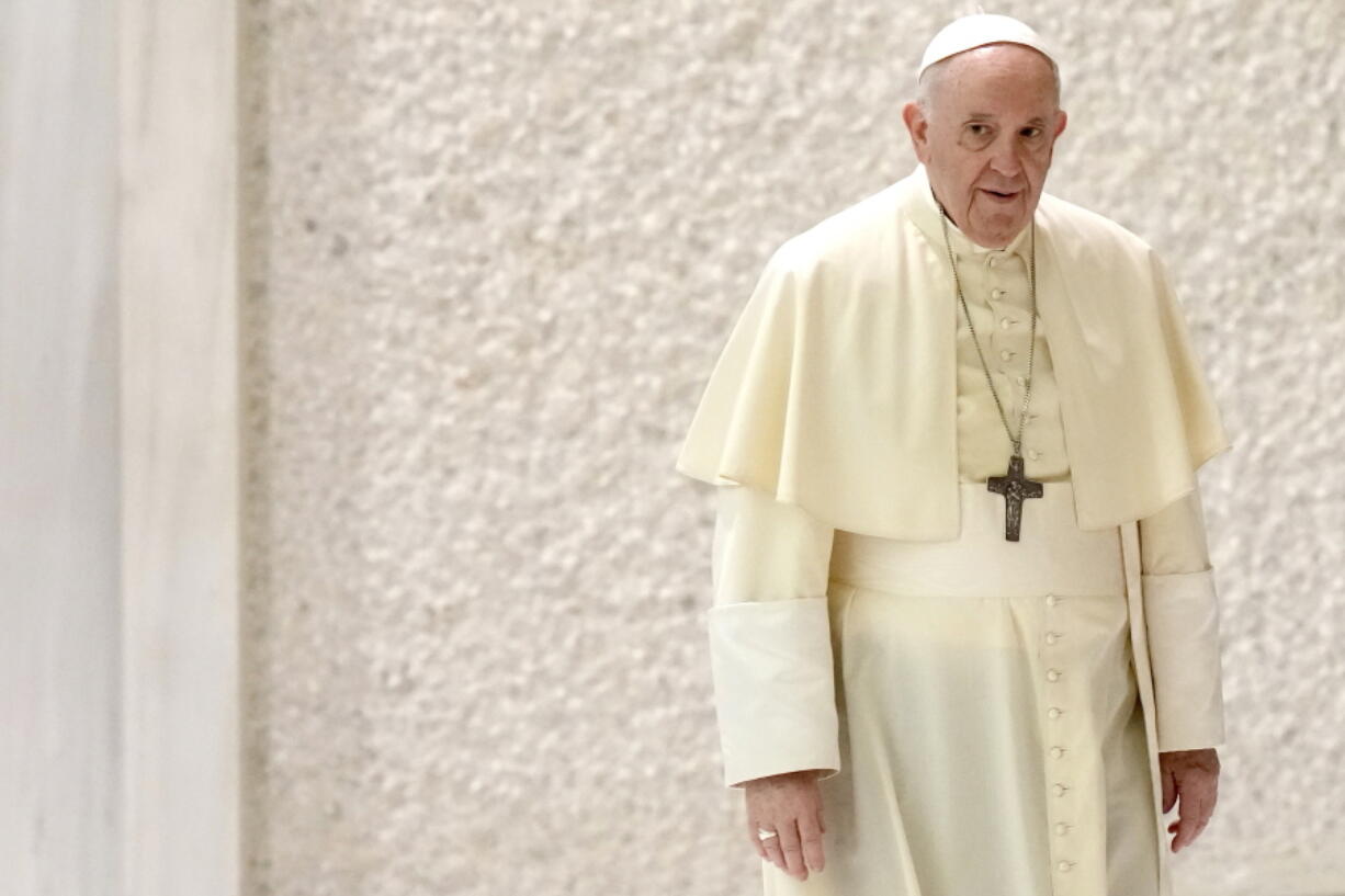 Pope Francis arrives for his weekly general audience in the Paul VI hall, at the Vatican, Wednesday, Sept. 1, 2021.