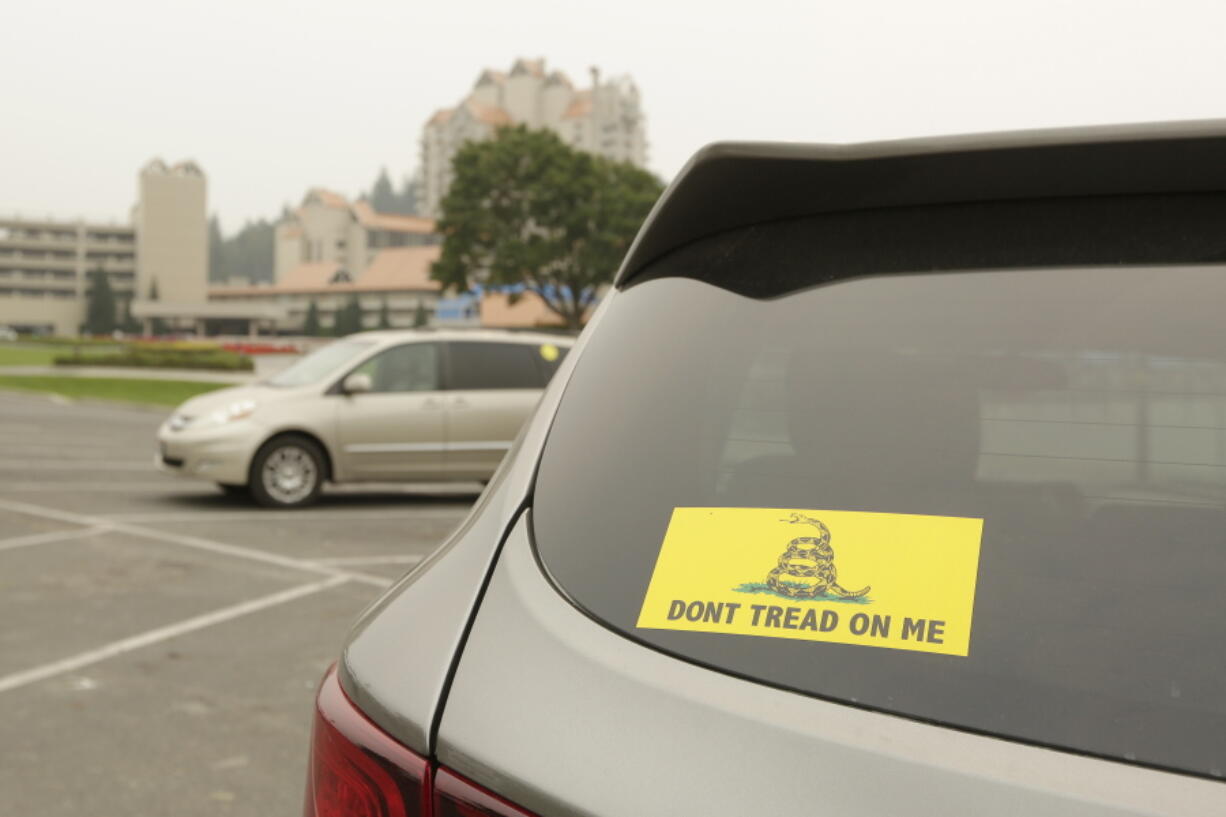 A vehicle with a Gadsden flag sticker is parked in the lot at Independence Point, Friday, Sept. 10, 2021, in Coeur d'Alene, Idaho.