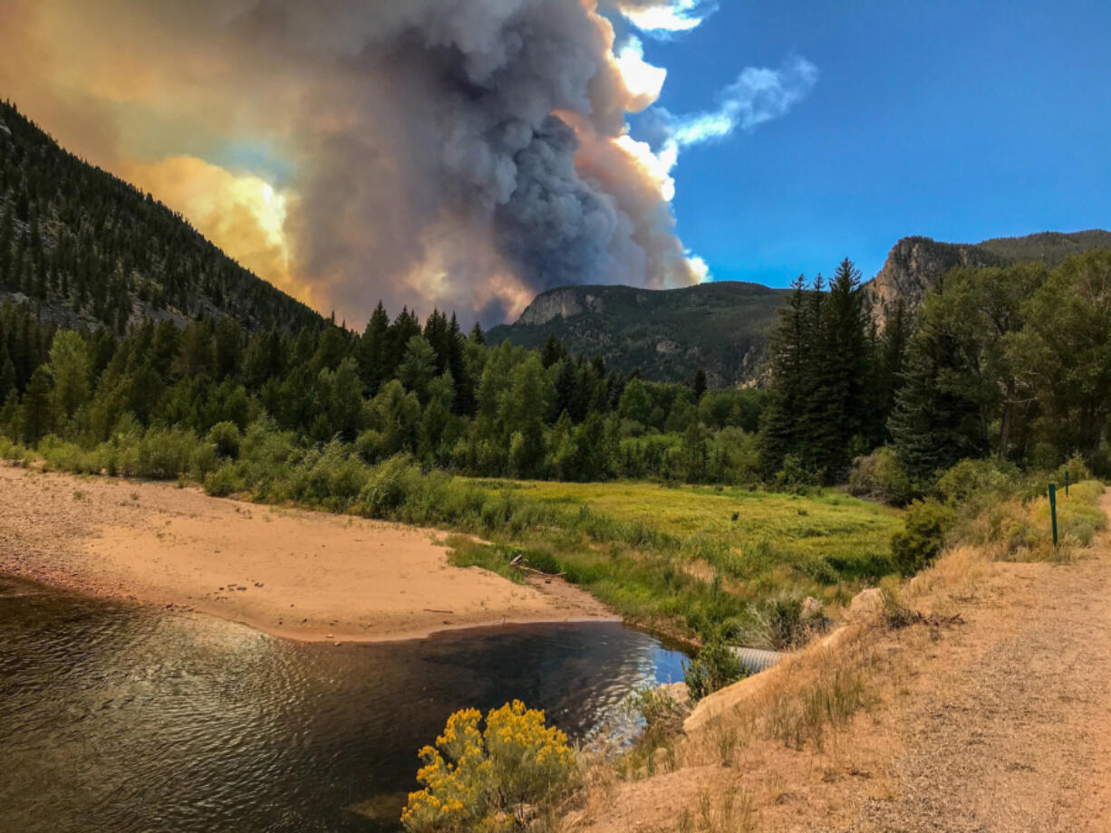 Wellington firefighters assist on the Cameron Peak fire in Colorado. The fire caused a closure in Rocky Mountain National Park on Aug. 18, 2020, according to a news release from park officials. Last year was the worst fire season in state history.