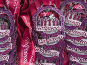 Medals are ready to award to participants of a previous Girlfriends Half Marathon in Vancouver. The 15th edition of the race is set for Sunday, starting and finishing at the Vancouver Waterfront.