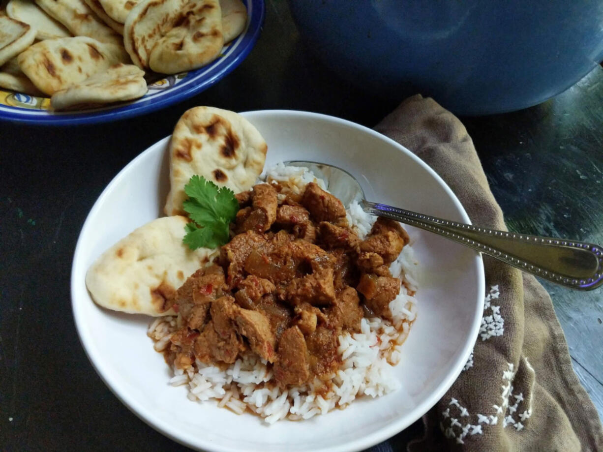 "Vindaloo" usually conjures up a searingly hot curry, but this recipe is relatively mild. It's made with pork butt and dried guajillo chiles.