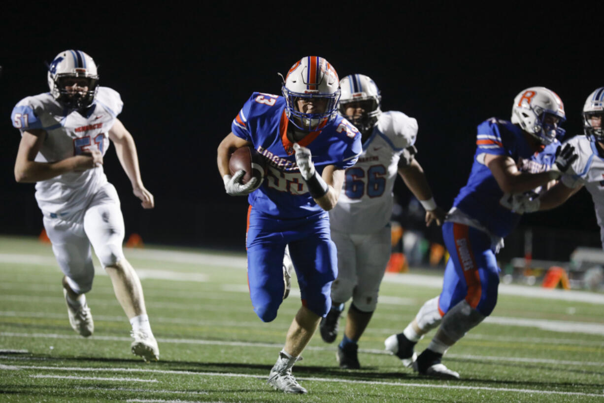 Ridgefield's Davis Pankow runs into the end zone for one of his three rushing touchdowns Thursday against Mark Morris in the 2A Greater St. Helens League game at Ridgefield High School. Ridgefield won 42-0.