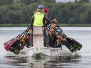 The Catch-22 dragon boat team, which includes a subdivision of breast cancer survivors, practices in August at Vancouver Lake.